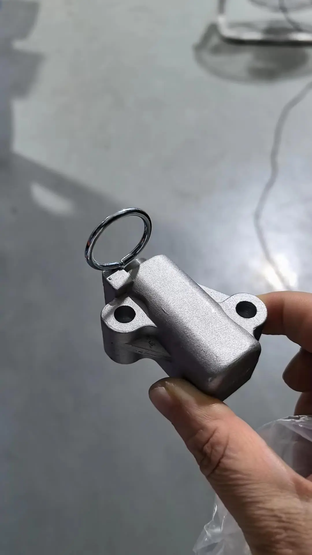 TIMING BELT TENSIONER ADJUSTER