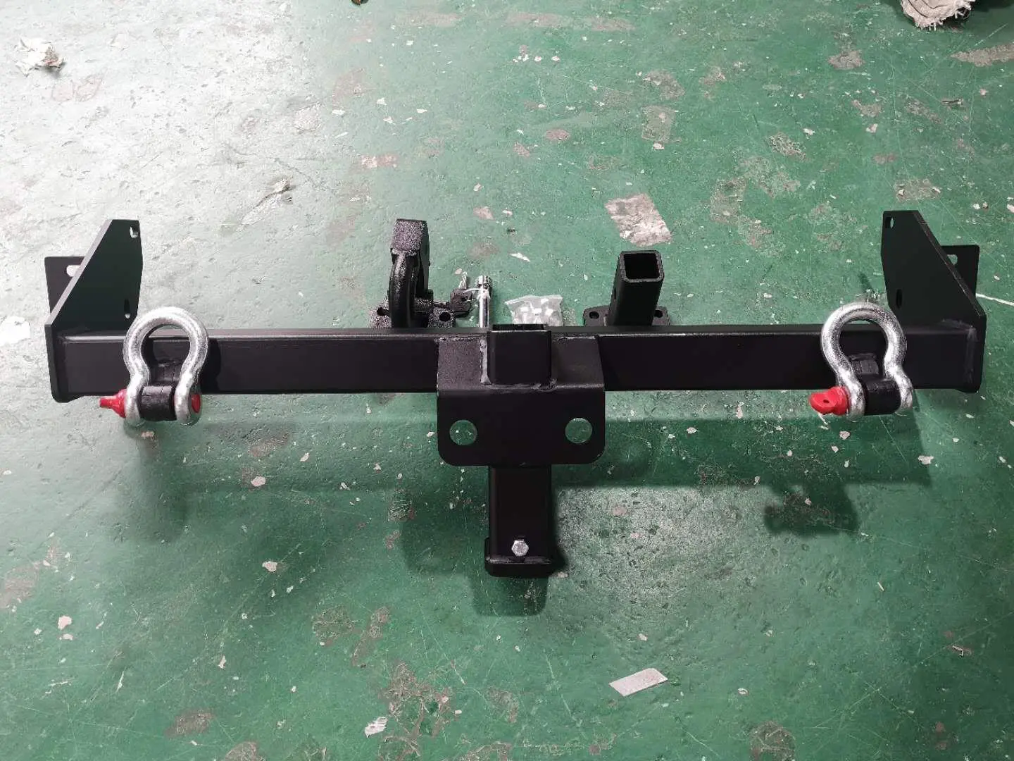 RR TRACTION HOOK PLATE